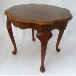 An inlaid French occasional table CONDITION: Please Note - we do not make reference