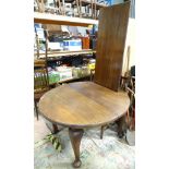 A late 19thC/early 20thC walnut oval extending dining table CONDITION: Please Note