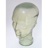 A mid- late 20thC Aqua-glass head, used for hat / wig advertising display,
