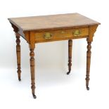 A late 19thC Ash pembroke table with a single long drawer above four turned tapering supports