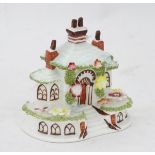 A Coalport model of a cottage, marked '"Keeper's Cottage" by Coalport, Fine Bone China,