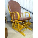 A modern rocking chair CONDITION: Please Note - we do not make reference to the