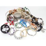 A quantity of assorted costume jewellery, to include necklaces, bracelets etc.