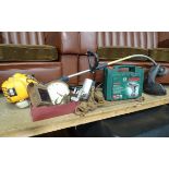A quanitty of tools to include a cased Bosch cordless drill, a Mcculloch petrol strimmer etc.