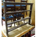 A Georgian oak plate rack CONDITION: Please Note - we do not make reference to the