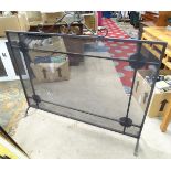 A large wrought iron fire screen CONDITION: Please Note - we do not make reference
