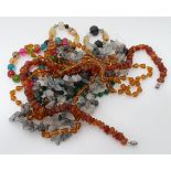A quantity of assorted hardstone beads, to include malachite, agate,