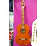 A classical guitar made by Suzuki violin company, Nagoya, Japan.