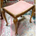 An upholstered oak piano stool CONDITION: Please Note - we do not make reference