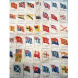 A silkwork postcard depicting flags of the British Empire CONDITION: Please Note -