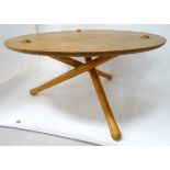 A circular tripod table CONDITION: Please Note - we do not make reference to the