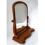 A Victorian mahogany toilet mirror CONDITION: Please Note - we do not make