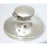 A silver capstan formed inkwell hallmarked Birmingham 1913 maker Henry Clifford Davis.