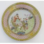 A Chinese famille rose plate decorated with Shou-Lao, the God of Longevity,