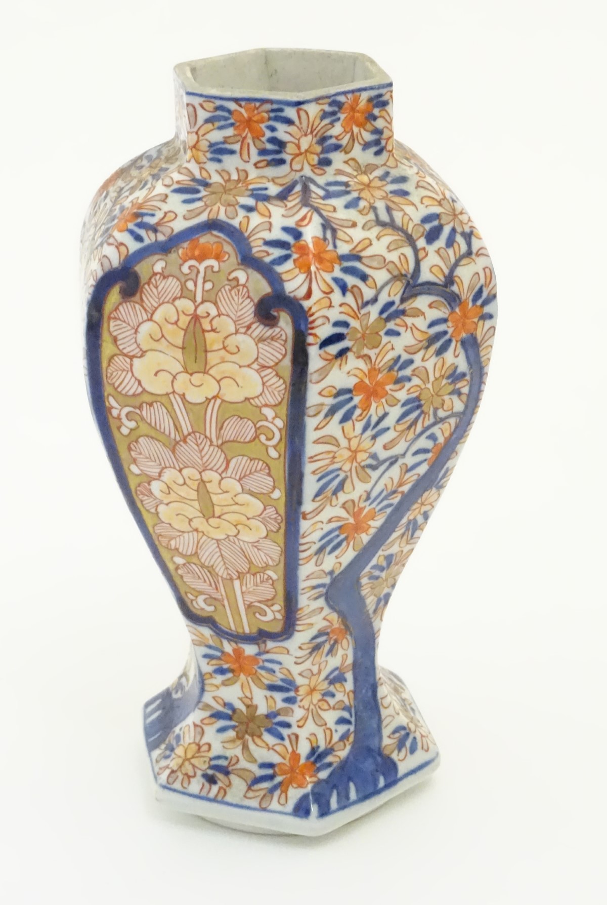 An Imari style hexagonal vase with panelled floral decoration and gilt highlights. 7 1/2" high. - Image 3 of 5