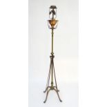 Arts and Crafts: 'WAS Benson' a signed floor standing telescopic standard lamp,