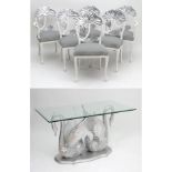 A late 20thC plate glass topped table with 6 chairs,