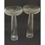 Pair of glass vases: a pair of clear tall glass vases, with polished pontil scars,