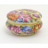 A hand painted German powder bowl / lidded pot, decorated with colourful flowers,