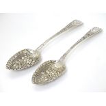 A matched pair of silver berry spoons, hallmarked London 1808 one by William Eley,