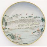 A Chinese export plate / dish depicting the Hongs at Canton, Thirteen Factories,