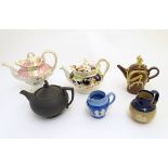 A quantity of assorted teapots,