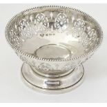 A silver pedestal bon bon dish hallmarked Birmingham 1933 maker Harrods Ltd.