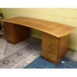 Vintage Retro: a signed Gordon Russell bespoke maple pedestal desk of bowed shape with two