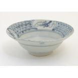 An 18thC Chinese blue and white bowl, with hand painted decoration,