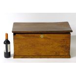 A small 19thC elm blanket box with wrought iron hinges and lid lifting to reveal storage space
