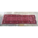 Carpet / Rug : A hand made woollen runner having 2 x 16 (32) geometric decoration to middle with