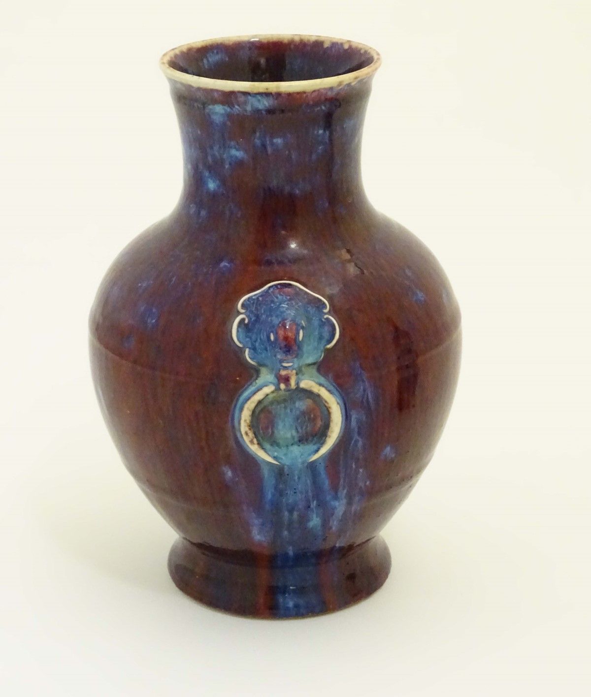 A Chinese high fired, sang de boeuf baluster vase with ring handle decoration. - Image 4 of 6