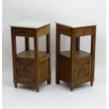 A pair of early 20thC Louis XVI style bedside cabinets with marble tops,