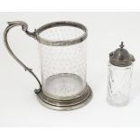 A cut glass cruet bottle with silver mount hallmarked London 1857 together with a A cut glass