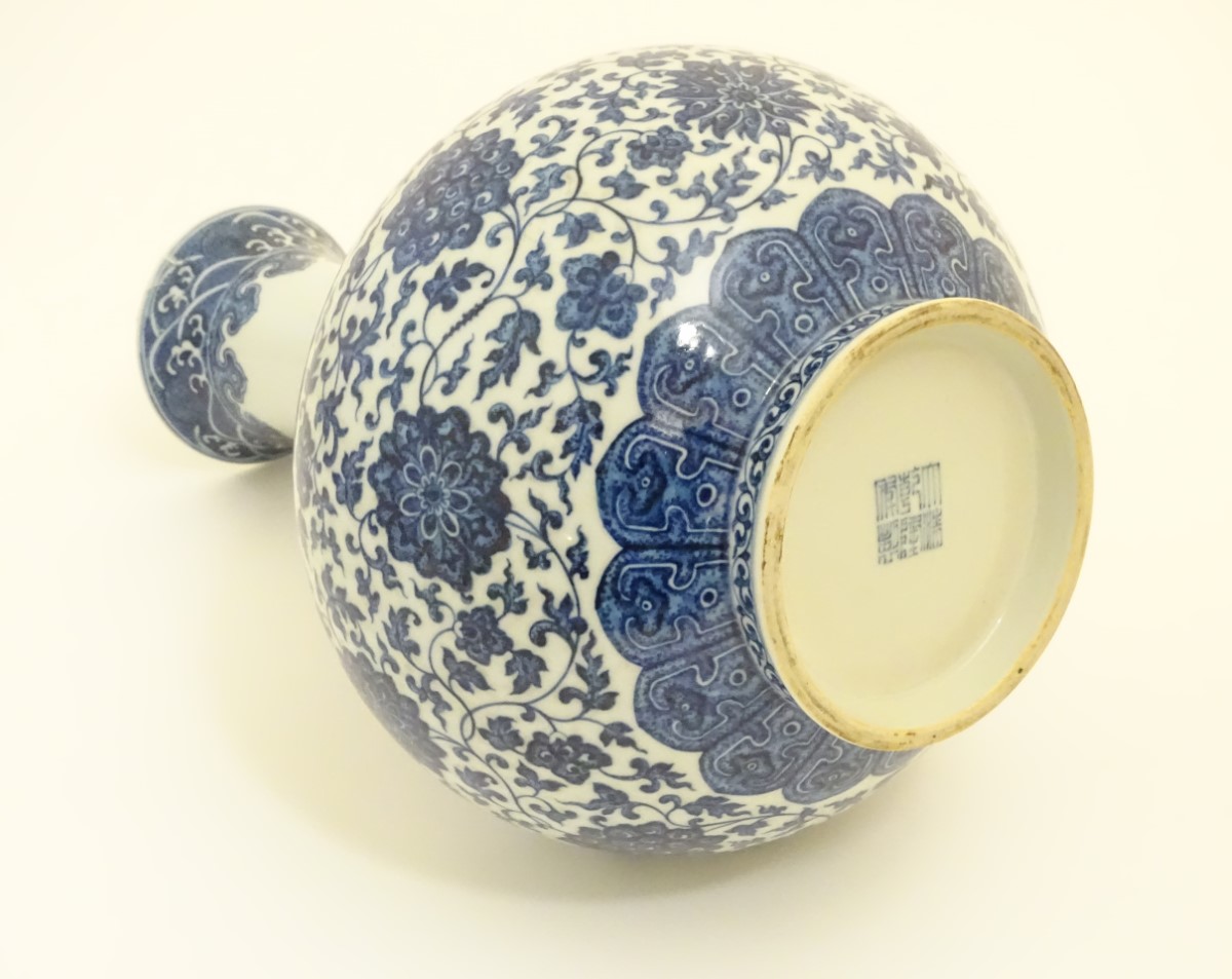 A Chinese blue and white 'Shang Ping' vase decorated with a broad band of flowers and scrolling - Image 2 of 5