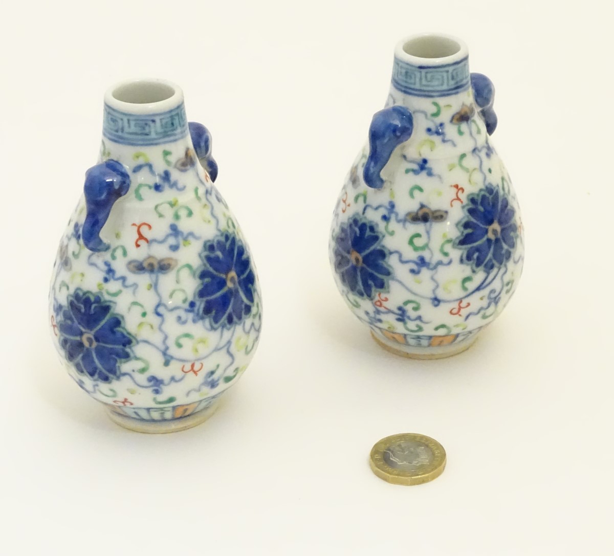A pair of Chinese miniature doucai baluster vases, decorated with flowers, - Image 5 of 6