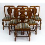 A set of six early / mid 20thC oak dining chairs,
