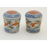 A pair of Chinese porcelain scroll ends with flying bat decoration (2) CONDITION: