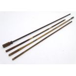 Shooting: A collection of four antique shotgun cleaning rods,