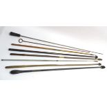 An assortment of Victorian and later gun/rifle cleaning rods,