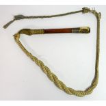 A beagling whip, comprising antler whistle knop, short wooden handle and ropetwist to leather thong.