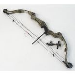 Archery: a Bear 'First Strike XLR' compound bow, in camouflage finish with sight,