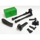 A small assortment of rifle accessories, to include a DRM diopter peephole sight,