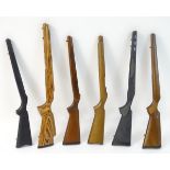 Six assorted Remington and Ruger rifle stocks, to include walnut, synthetic and laminated examples.