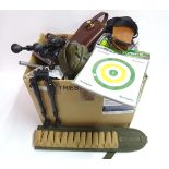 A box containing a large quantity of shooting equipment and accessories, including telescopic sight,