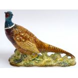 Beswick: a hand painted ceramic pheasant, no 1225, standing 7 1/2” high.