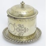 A silver plate biscuit box with hinged lid. maker Martin Hall & Co.