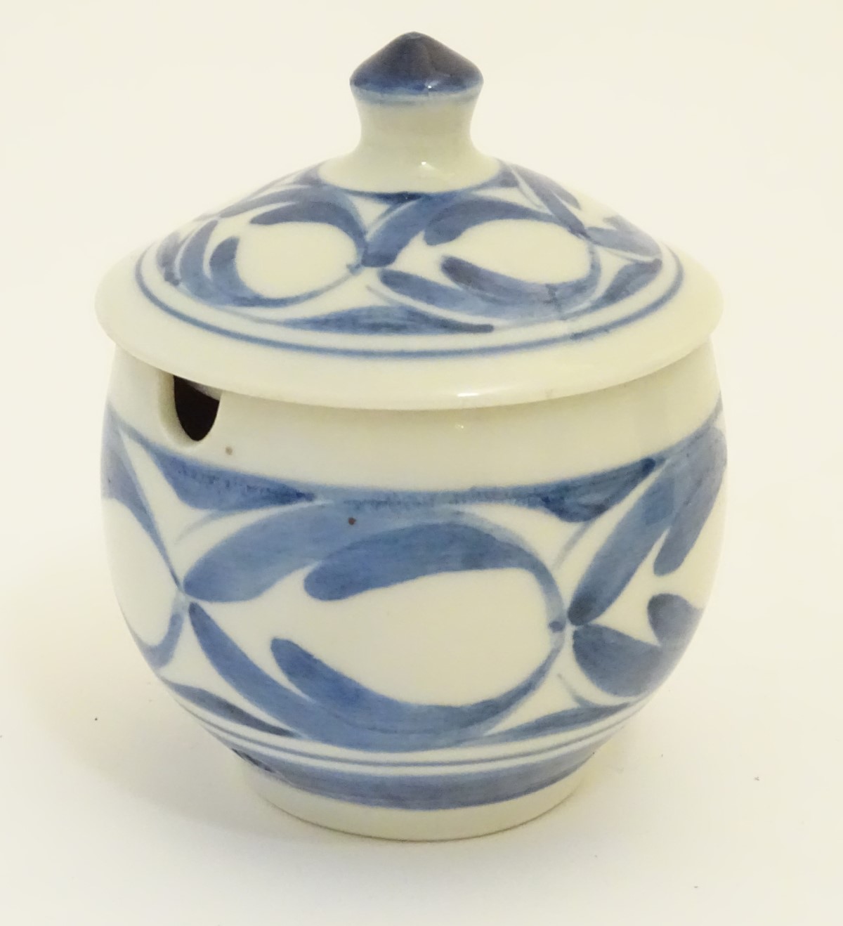 A Derek Emms studio pottery lidded preserve pot, with blue and white stylised foliage decoration. - Image 4 of 7