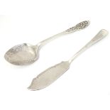 A silver butter knife hallmarked Sheffield 1901 together with a silver preserve spoon (2) (36g)