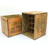 Advertising: two whiskey crates marked 'Laird Scotch Whisky' and 'Lankester & Wells, Northampton'.